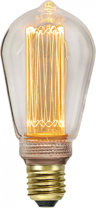 Koristeellinen LED-lamppu kirkkaalla lasilla.